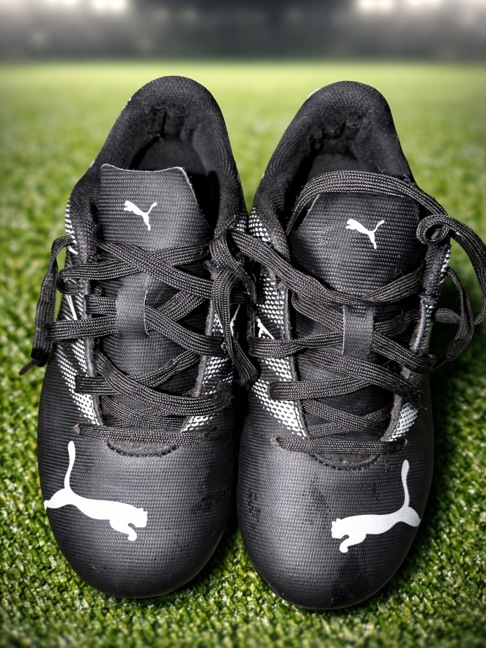 Kids Puma Black Cleats with White Puma Logos Size 1